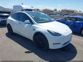 2022 Tesla Model Y — photo 1 of 18 | VIN 7SAYGDEE2NF461710