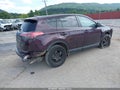 2018 Toyota RAV4 — photo 4 of 17 | VIN 2T3BFREV6JW773181