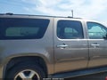 2011 Chevrolet Suburban 1500 — photo 14 of 17 | VIN 1GNSKHE32BR392103