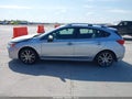 2018 Subaru Impreza — photo 14 of 17 | VIN 4S3GTAU61J3704797