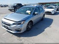 2018 Subaru Impreza — photo 2 of 17 | VIN 4S3GTAU61J3704797