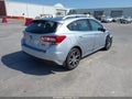2018 Subaru Impreza — photo 4 of 17 | VIN 4S3GTAU61J3704797