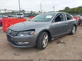 2013 Volkswagen Passat — photo 2 of 16 | VIN 1VWCN7A31DC082788