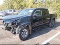 2023 Toyota Tacoma — photo 2 of 16 | VIN 3TMCZ5AN3PM581818