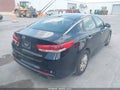 2016 Kia Optima — photo 4 of 17 | VIN 5XXGT4L32GG106901