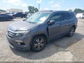 2016 Honda Pilot — photo 2 of 16 | VIN 5FNYF5H88GB017195