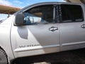2006 Nissan Titan — photo 14 of 16 | VIN 1N6AA07B56N562932