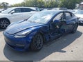 2021 Tesla Model 3 — photo 2 of 14 | VIN 5YJ3E1EB8MF948037