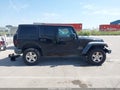 2016 Jeep Wrangler Unlimited — photo 14 of 17 | VIN 1C4BJWDG1GL288247