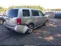2014 Honda Pilot — photo 4 of 16 | VIN 5FNYF4H59EB034889