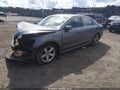 2014 Volkswagen Passat — photo 2 of 17 | VIN 1VWBS7A38EC055142