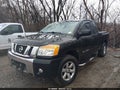 2010 Nissan Titan — photo 2 of 16 | VIN 1N6AA0CC5AN320598