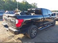 2018 Nissan Titan — photo 4 of 17 | VIN 1N6BA1F41JN531456