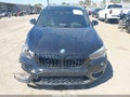 2017 BMW X1 — photo 12 of 16 | VIN WBXHU7C35H5H34420