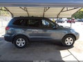 2009 Hyundai Santa Fe — photo 13 of 16 | VIN 5NMSG13D29H256419