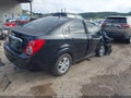 2014 Chevrolet Sonic — photo 4 of 17 | VIN 1G1JC5SGXE4127902