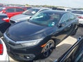 2016 Honda Civic — photo 2 of 15 | VIN 19XFC1F99GE042066