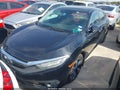 2016 Honda Civic — photo 6 of 15 | VIN 19XFC1F99GE042066
