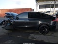 2025 Tesla Model Y — photo 13 of 15 | VIN 7SAYGAEEXSF262334