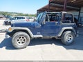 2005 Jeep Wrangler — photo 15 of 17 | VIN 1J4FA49S65P313131
