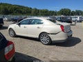 2015 Lincoln MKS — photo 14 of 16 | VIN 1LNHL9EK5FG604275