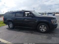 2013 Chevrolet Suburban 1500 — photo 13 of 16 | VIN 1GNSCJE08DR256281