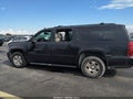 2013 Chevrolet Suburban 1500 — photo 14 of 16 | VIN 1GNSCJE08DR256281