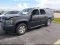 2013 Chevrolet Suburban 1500 — photo 2 of 16 | VIN 1GNSCJE08DR256281