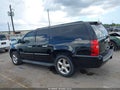 2013 Chevrolet Suburban 1500 — photo 13 of 15 | VIN 1GNSCKE09DR254836