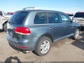 2004 Volkswagen Touareg — photo 4 of 16 | VIN WVGCM77L94D063084