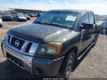 2008 Nissan Titan — photo 2 of 11 | VIN 1N6AA07D98N304904