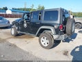 2015 Jeep Wrangler Unlimited — photo 3 of 17 | VIN 1C4BJWDGXFL511576