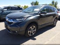 2018 Honda CR-V — photo 2 of 22 | VIN 7FARW2H8XJE105342