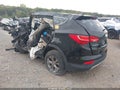 2014 Hyundai Santa Fe — photo 3 of 10 | VIN 5XYZU3LBXEG142920