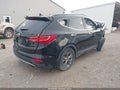 2014 Hyundai Santa Fe — photo 4 of 10 | VIN 5XYZU3LBXEG142920