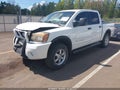 2012 Nissan Titan — photo 2 of 18 | VIN 1N6BA0ECXCN306619