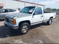 1993 GMC Sierra — photo 2 of 11 | VIN 1GTEK14K2PZ527979