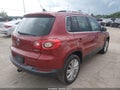 2010 Volkswagen Tiguan — photo 4 of 11 | VIN WVGAV7AX7AW003580
