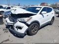 2015 Hyundai Santa Fe — photo 2 of 11 | VIN 5XYZT3LB6FG258958