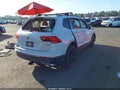 2018 Volkswagen Tiguan — photo 4 of 16 | VIN 3VV2B7AX0JM182113
