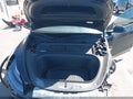 2023 Tesla Model Y — photo 10 of 17 | VIN 7SAYGDEE8PF919589