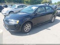 2014 Volkswagen Jetta — photo 2 of 15 | VIN 3VWD17AJ7EM357143