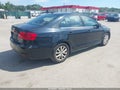 2014 Volkswagen Jetta — photo 4 of 15 | VIN 3VWD17AJ7EM357143