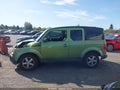 2006 Honda Element — photo 14 of 16 | VIN 5J6YH28796L021195