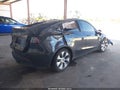 2024 Tesla Model Y — photo 4 of 15 | VIN 7SAYGDED4RF091230