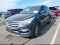 2017 Hyundai Santa Fe — photo 2 of 17 | VIN 5NMZU3LB3HH033404