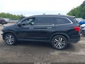 2016 Honda Pilot — photo 14 of 16 | VIN 5FNYF6H97GB100177