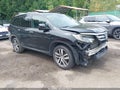2016 Honda Pilot — photo 1 of 16 | VIN 5FNYF6H97GB100177