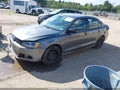 2014 Volkswagen Jetta — photo 2 of 16 | VIN 3VW2K7AJ5EM329376