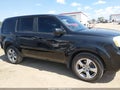 2013 Honda Pilot — photo 13 of 16 | VIN 5FNYF4H56DB011360